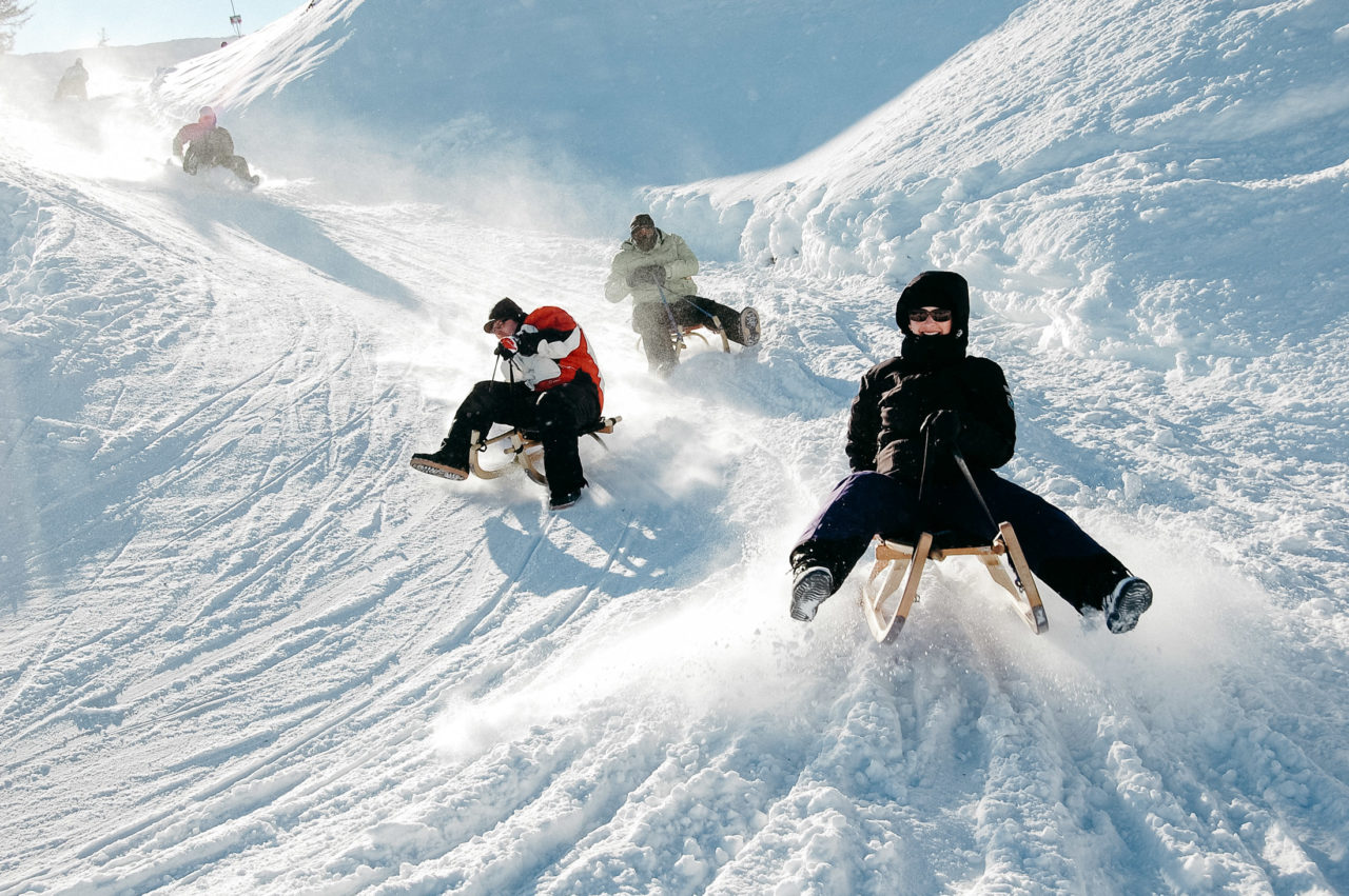 Tobogganing, tobogganing with friends in Kaprun Zell am See